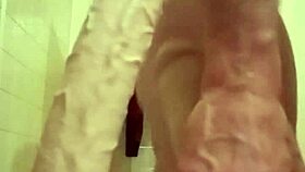 Engaging in detailed self-pleasuring activities with extreme toys and dildos.