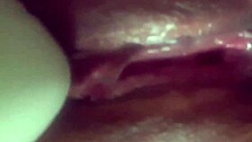 Latina masturbates with vibrator close up