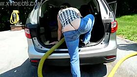at the car wash, a big ass milf flashes her curves in low rise jeans