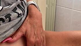 In the early morning, she gently caresses her small clit with fingers