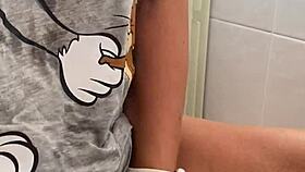 In the early morning, she gently caresses her small clit with fingers