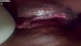 Latina masturbates with vibrator close up