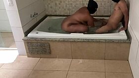 we were relaxing in the bath, and i gave my ass to the guy