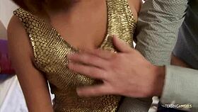 Hey, that asian babe in the golden dress is moaning so loud while riding that cock hard and fingering her wet pussy