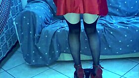 ballerina in red silk and nylon stockings indulges in self-pleasure with a dildo during a solo fetish session