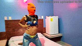 Brunette celebrates Halloween in hotel bed