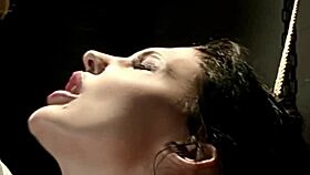 Seductive sex bomb tied up begging for dick