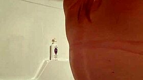 New content: someone prepares for outdoor shower experience