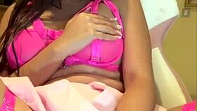 Beautiful Latina teases natural tits while masturbating to climax