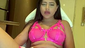 Beautiful Latina teases natural tits while masturbating to climax
