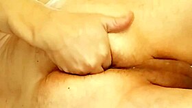 The fat gay slut explores anal pleasures with toys