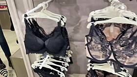 Milf masturbates in changing room