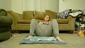 Redhead amateur Anastaisa squirts intensely while fingering her clit in homemade leggings session