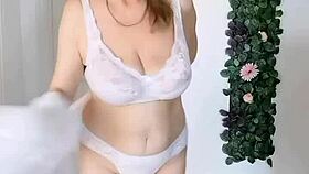 Busty granny shows horny pussy close up in natural tits and lingerie