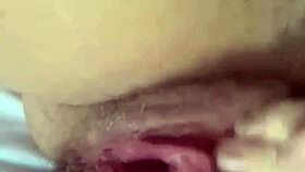 Teasing my wet pussy by the window hoping for a voyeur