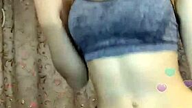 the hot indian model is posing sexily for the camera