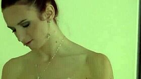 Redhead girl masturbates delicately