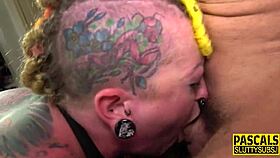 tattooed submissive slut throating