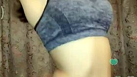 the hot indian model is posing sexily for the camera