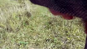 on this wild beach, does the naked blonde notice the pervert jerking off?