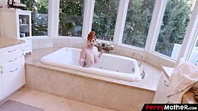 pervy mature redhead gives wet titty fuck in bathroom fantasy