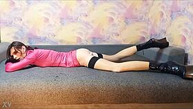 Ponygirl Crossdresser Poses Seductively on Couch