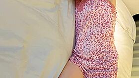 Young woman models flower print camisole, showcasing slender figure and small waist