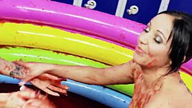 romana ryder and tammie lee rub their naked bodies together in a jam bath