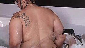 madrastra gets hot in the jacuzzi-