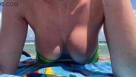 Hot italian milf artemisia love shows off big tits in micro bikini at public beach in miami