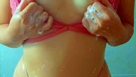 beautiful tanned latina girls shower after a beach day