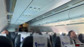 Public airplane flashing leads to quick cum from beautiful girl