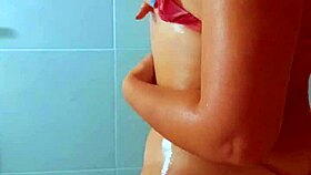 beautiful tanned latina girls shower after a beach day