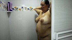 hey, check out this curvy Colombian milf with huge natural tits squirting in the bath, doesn't she look so tempting?