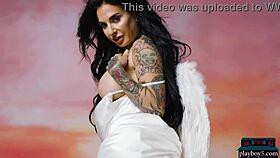 Busty milf joanna angel shows her luscious body with tattoos for playboy