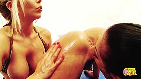 Wrestling practice turns into a lesbian threesome once the chicks start slathering themselves in syrup?