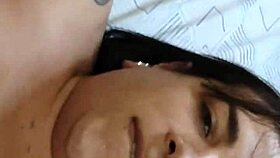 Tattooed crossdresser enjoys a moment with a handsome blonde guy