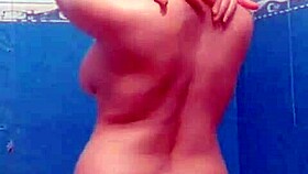 hidden cam in bathroom catches milf masturbating her big tits