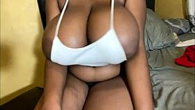 Intense ebony babe flaunts huge natural tits and big ass