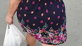 i follow and lift the skirt of a woman on the street