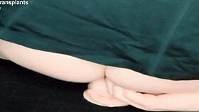 Is this trans woman riding a dildo seductively?