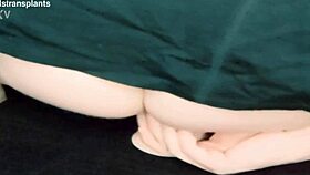 Is this trans woman riding a dildo seductively?