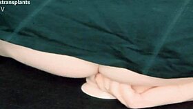 Is this trans woman riding a dildo seductively?