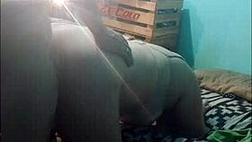 We fuck doggy style on the bed for the webcam