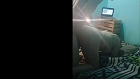 We fuck doggy style on the bed for the webcam