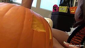 Abigail Mac strokes her big tits in Halloween solo fun 🎃🔥