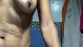 check out this mature spanish woman teasing her big tits and pussy