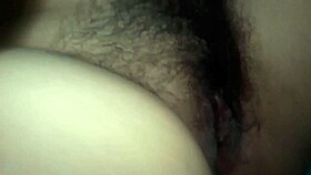 woman strikes vagina repeatedly with large dildo toy