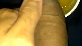 old monster cock pisses teasingly in the mug