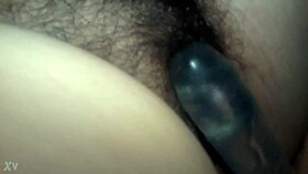 woman strikes vagina repeatedly with large dildo toy